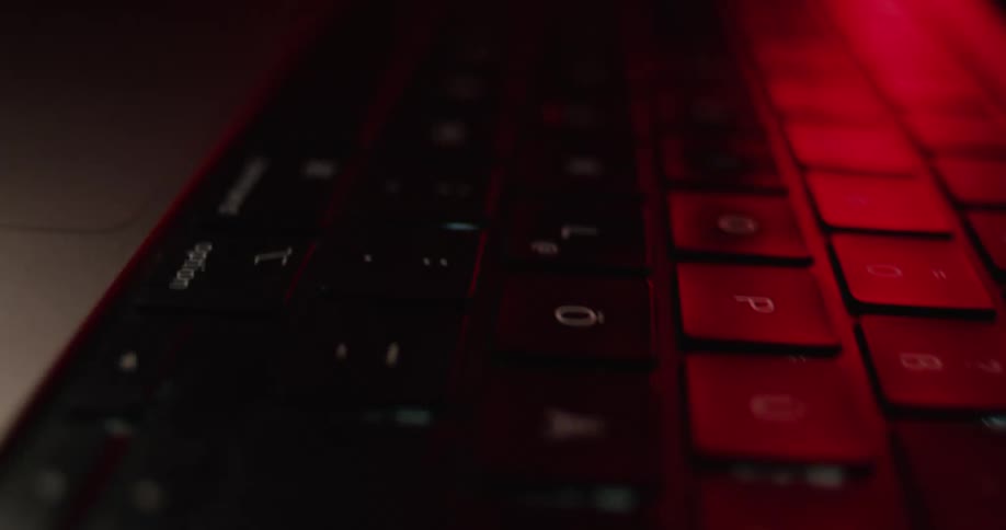 A laptop with a keyboard