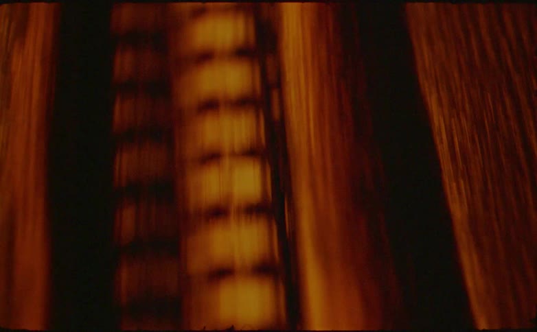 Parallel strips with textures and patterns pass underneath