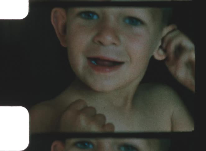 Child looking with a gentle smile