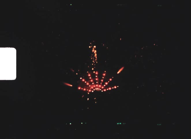 A firework being launched and exploding