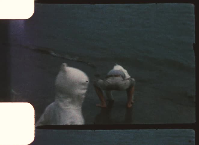 Two children playing at the beach