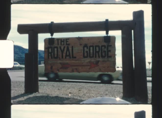 royal gorge 1970  Cars drive past the national park sign