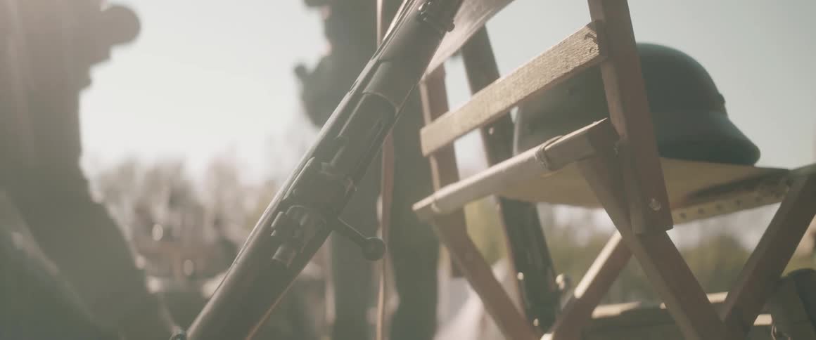 A group of soldiers near a gun