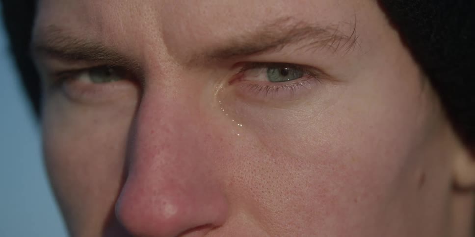 Closeup of a face with lightcolored eyes