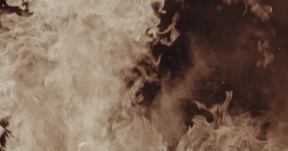 Flames and smoke in sepia tones with upward motion