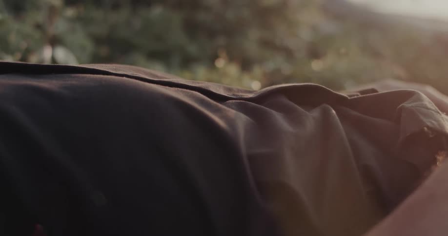 Person lying outdoors