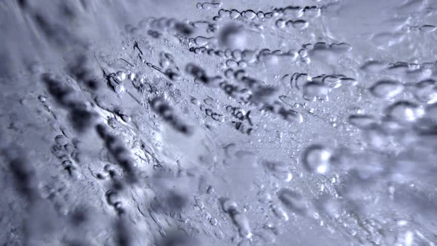 Translucent ice with bubbles and internal fractures distributed irregularly