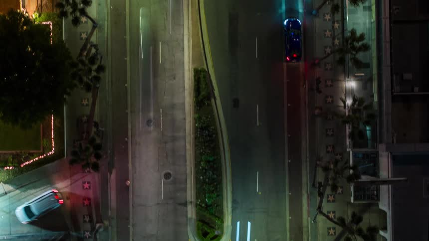 Aerial looking down on a busy Hollywood Boulevard in Los Angeles at night