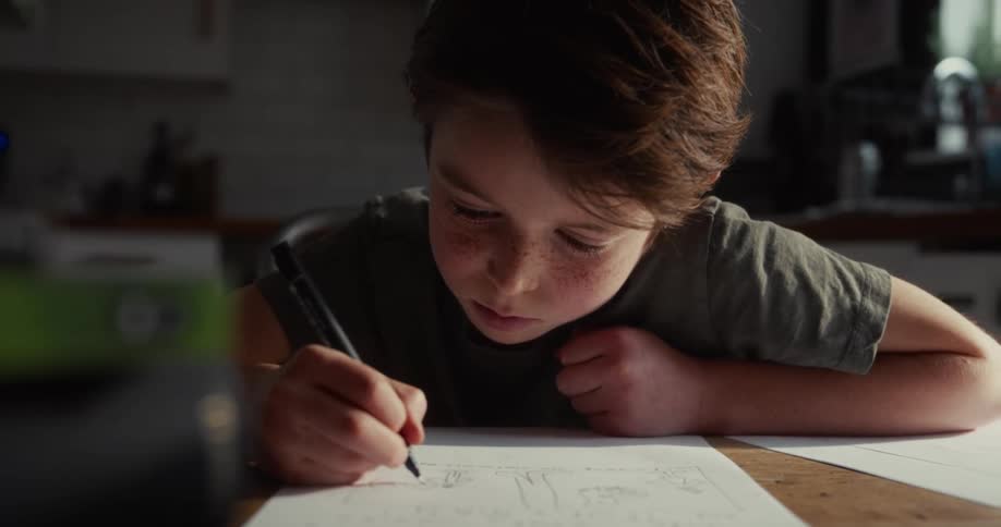 A child writing on paper