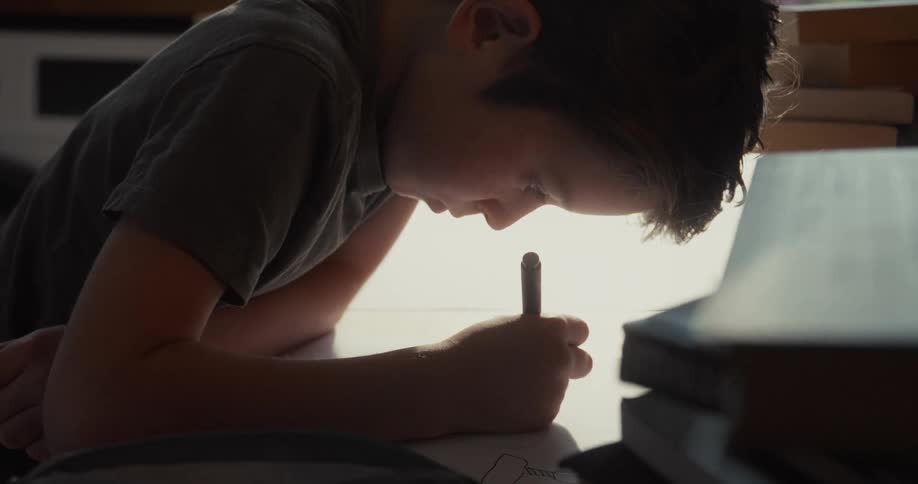 A child writing on paper