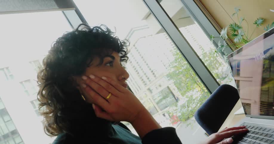 A woman using a laptop
