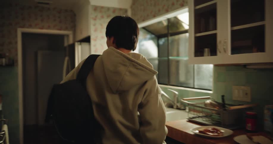 Boy eating breakfast quickly