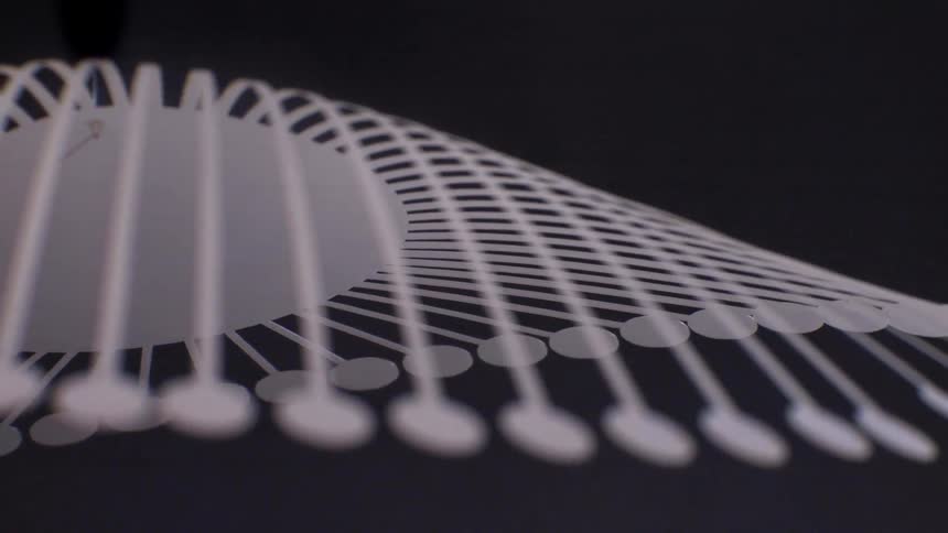 Abstract white object with lines and dots at the ends