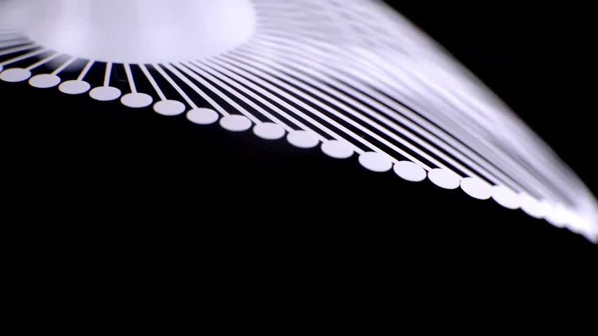 Patterned object against a black background