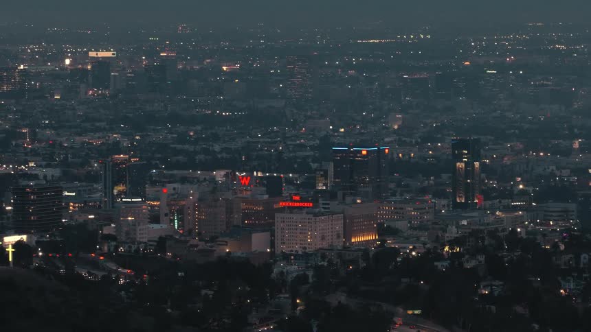 Streets and buildings on a metropolitan area outdoors during night time
