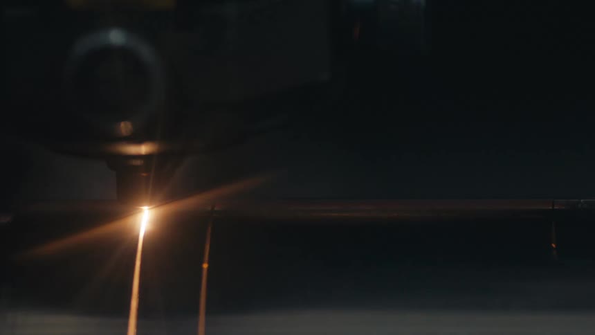 Machine performing metal cutting with dispersed sparks