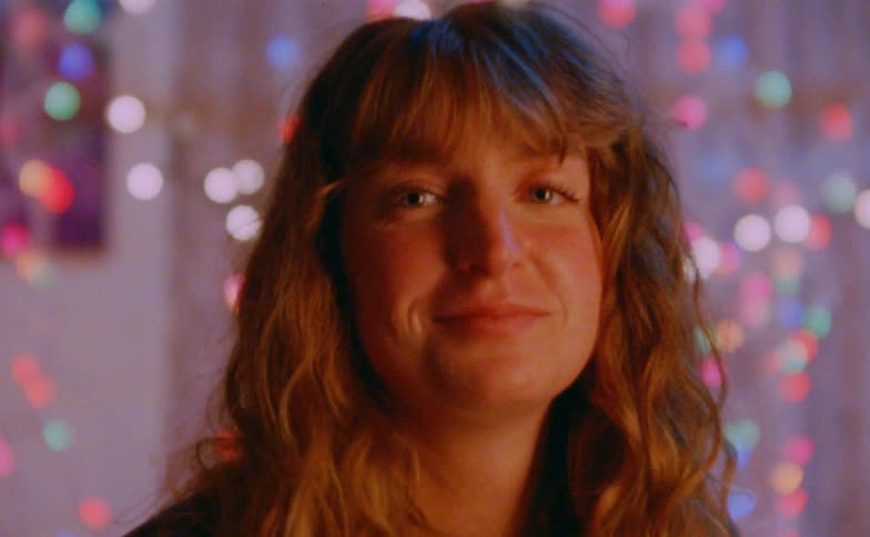 A portrait of a woman in a room