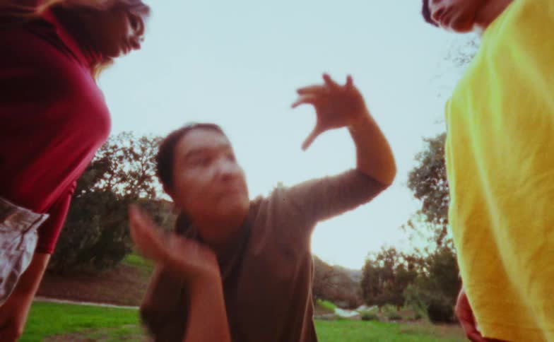 A woman dancing outdoors
