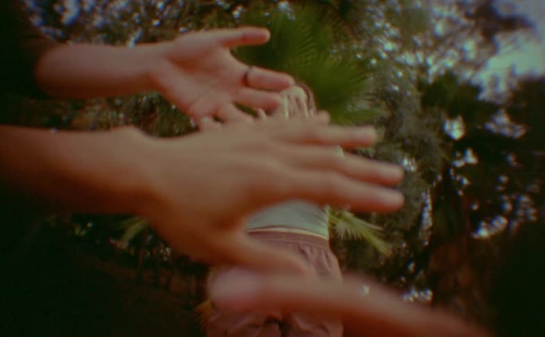 A woman dancing outdoors
