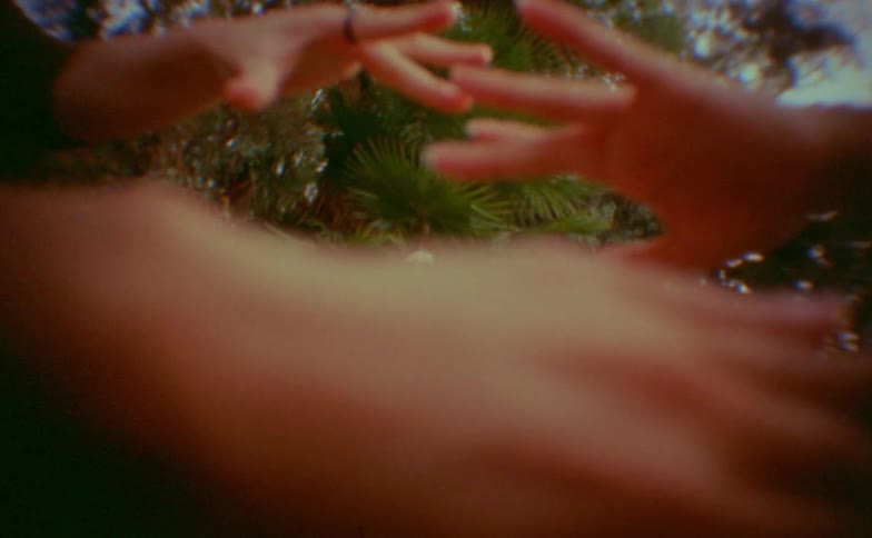A woman dancing outdoors
