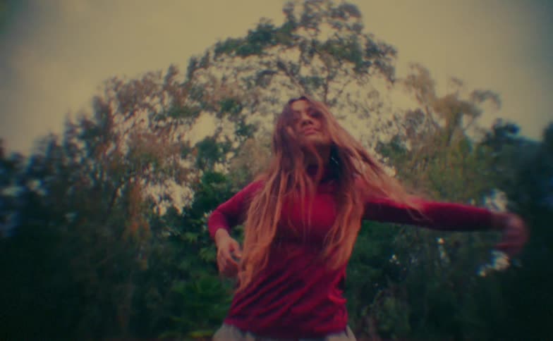 Woman in red dancing