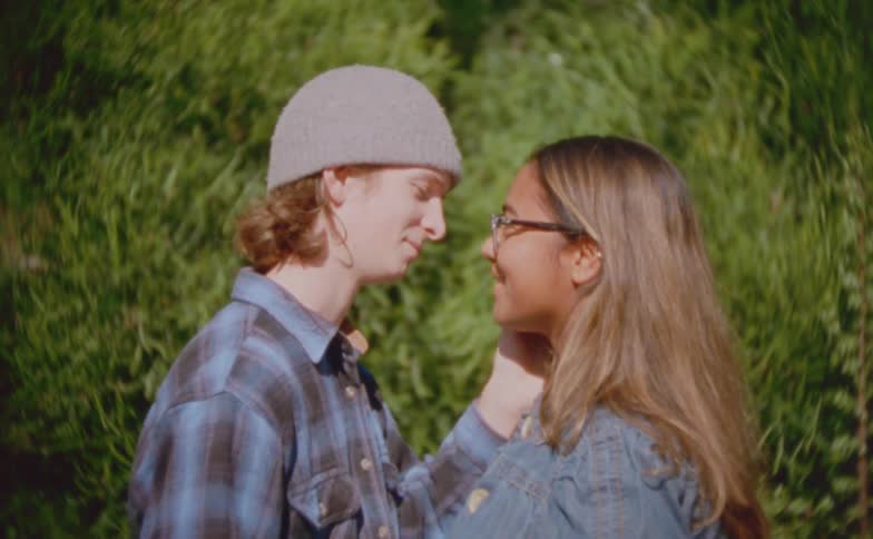 The man and woman are staring into each others eyes while talking