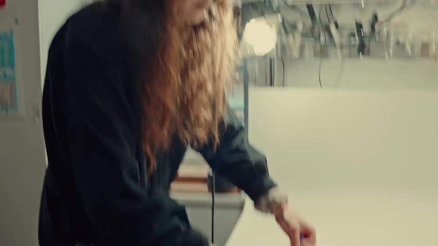 A woman working in a workshop