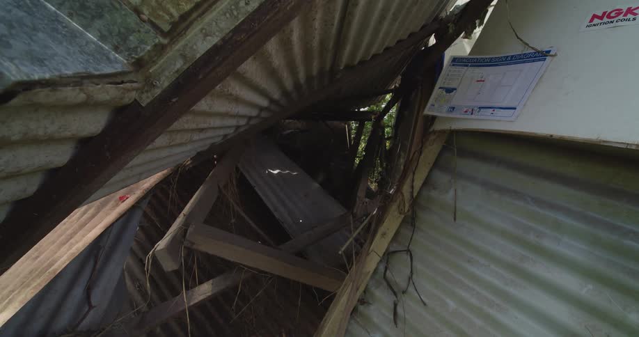 A view of a house that has been damaged