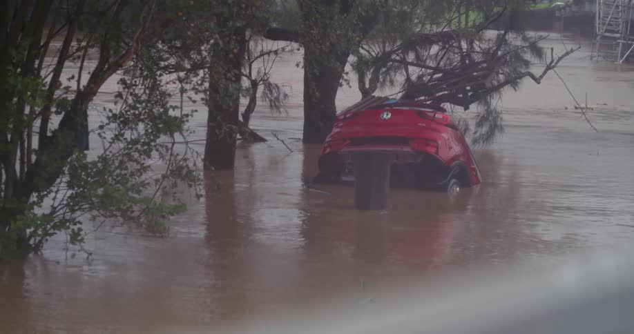 Car floats away on the water during severe flooding