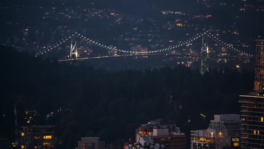 Heavy traffic moves over the bridge