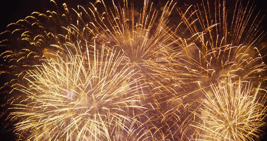 A series of fireworks lighting up the night sky