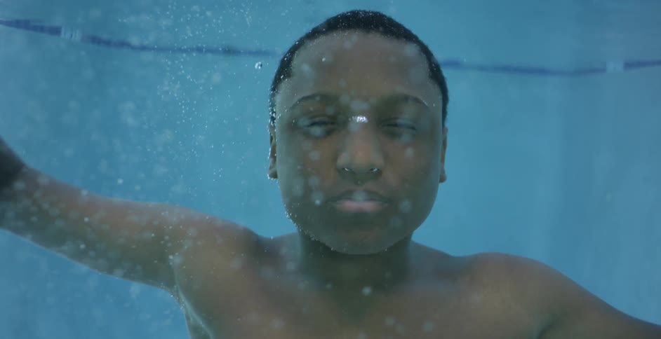 Child swimming underwater