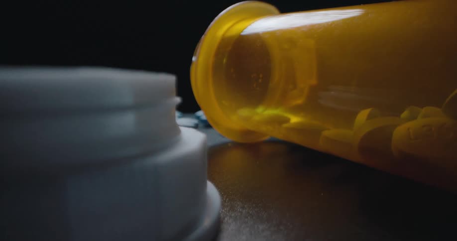 A close up of a pill bottle