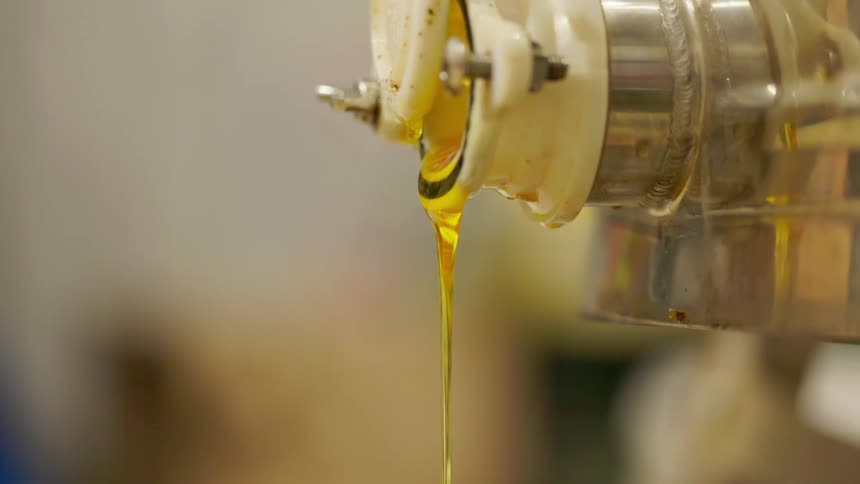 Honey drips from the faucet