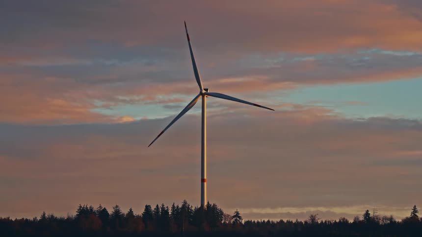 A turbine spinning at sunset