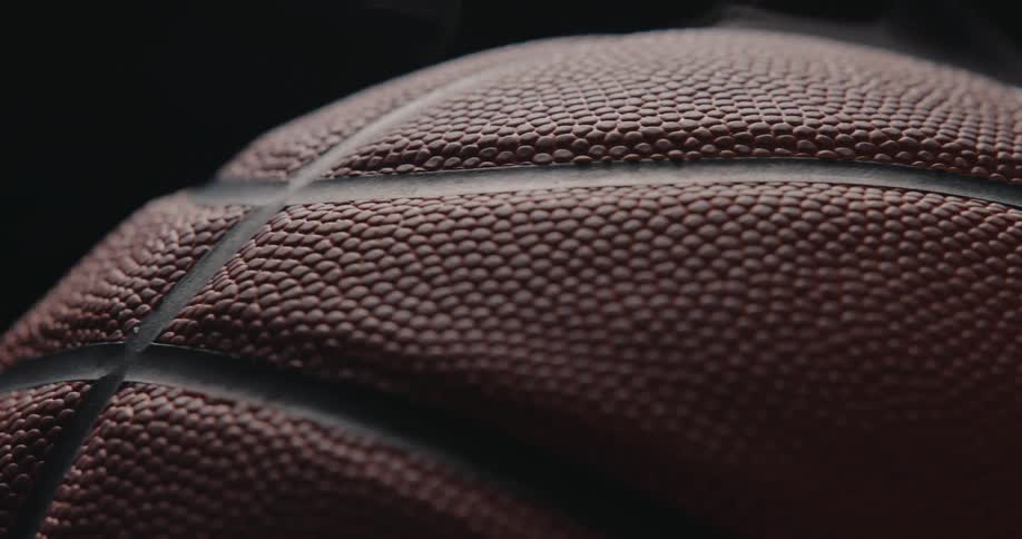 Basketball in closeup showing a pebbled texture