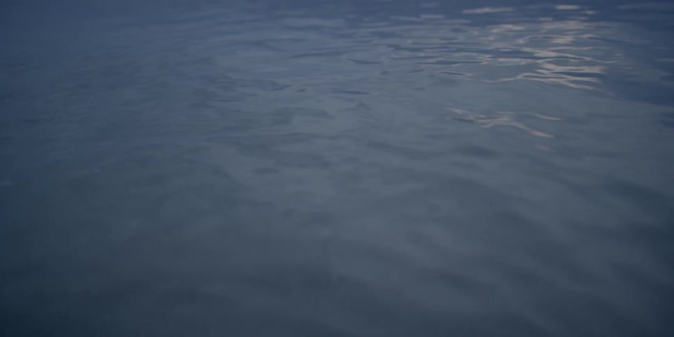 A body of water rippling and flowing