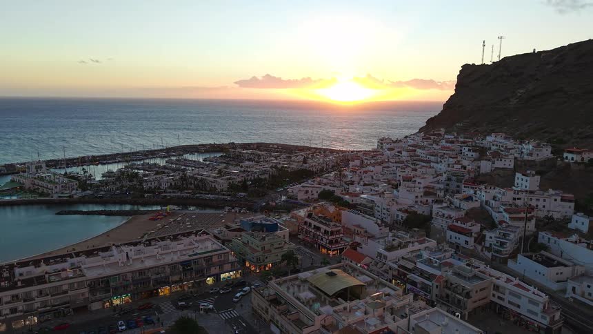 An aerial view of a small city near the coast