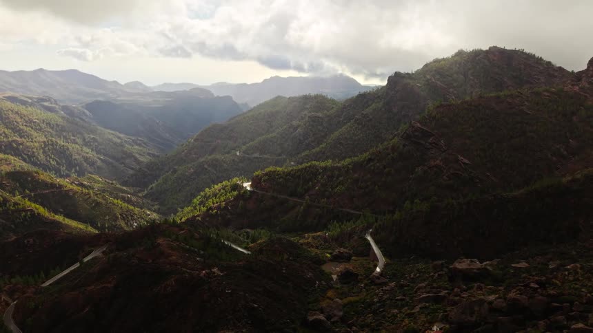 Natural landscape of a mountainous regions with valleys outdoors during day time