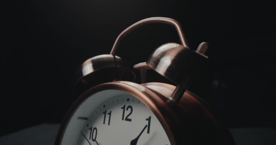A vintage alarm clock ringing