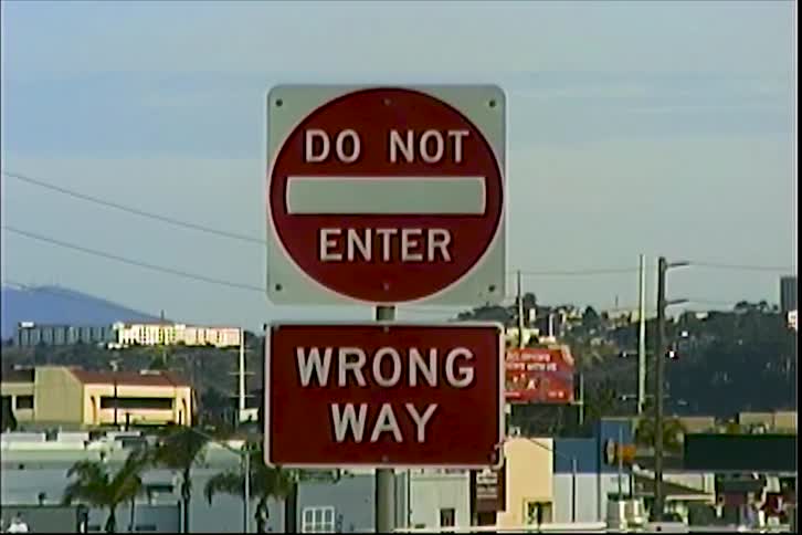 A view of a street sign in a city