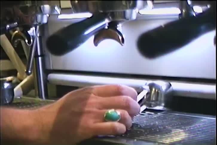Fresh espresso flows in twin streams from machine