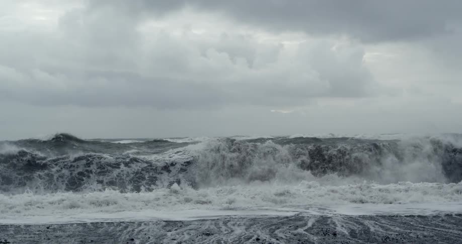 Waves crash against the shore