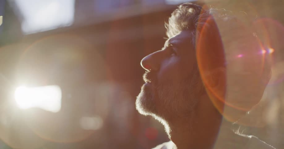 Bearded man looking around