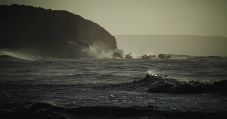 Ocean waves crashing against rocks