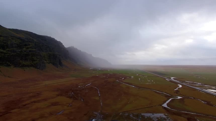 Fog covers the mountain ahead