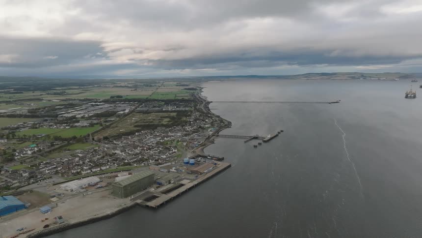 Aerial view of an urban city on the edge of a waterway