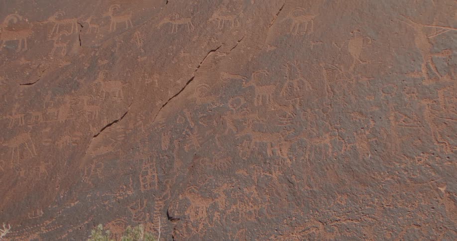 Petroglyphs carved into the side of the canyon rock