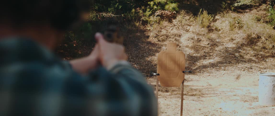 The shells fly from the gun as it is fired at a target