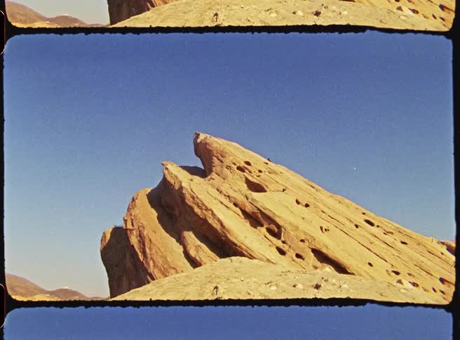 A view of some rocks and formations in the desert
